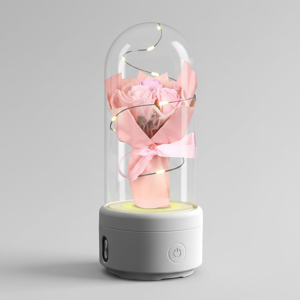 	Bouquet lumineux sous dôme en verre enceinte Bluetooth LED – Rose socle Blanc | Les Roses De Lola photo de couverture